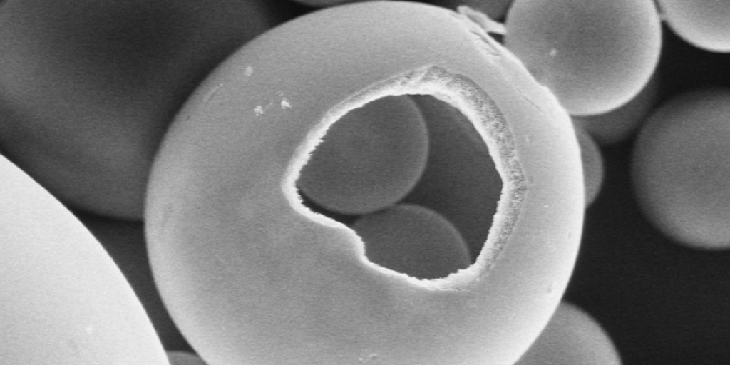 Porous hollow glass microspheres